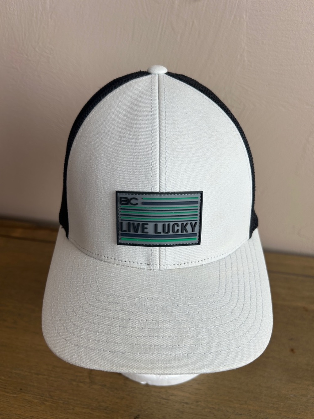 Black Clover Live Lucky White & Black Patch Adjustable Snapback Golf Hat. Sample